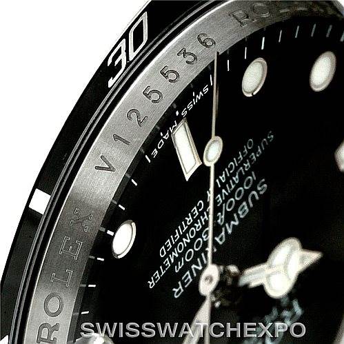This image shows a close-up angle of the Rolex Submariner 16610 Men
s Stainless Steel Black Dial 16610 Men
s Stainless Steel Black Dial watch, focusing on the bezel, dial, and part of the crystal.