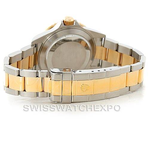 This image shows the back case and two-tone bracelet of a Rolex Submariner 16613 Men
s Steel and Gold (two tone) Grey Dial 16613 Men
s Steel and Gold (two tone) Grey Dial watch.