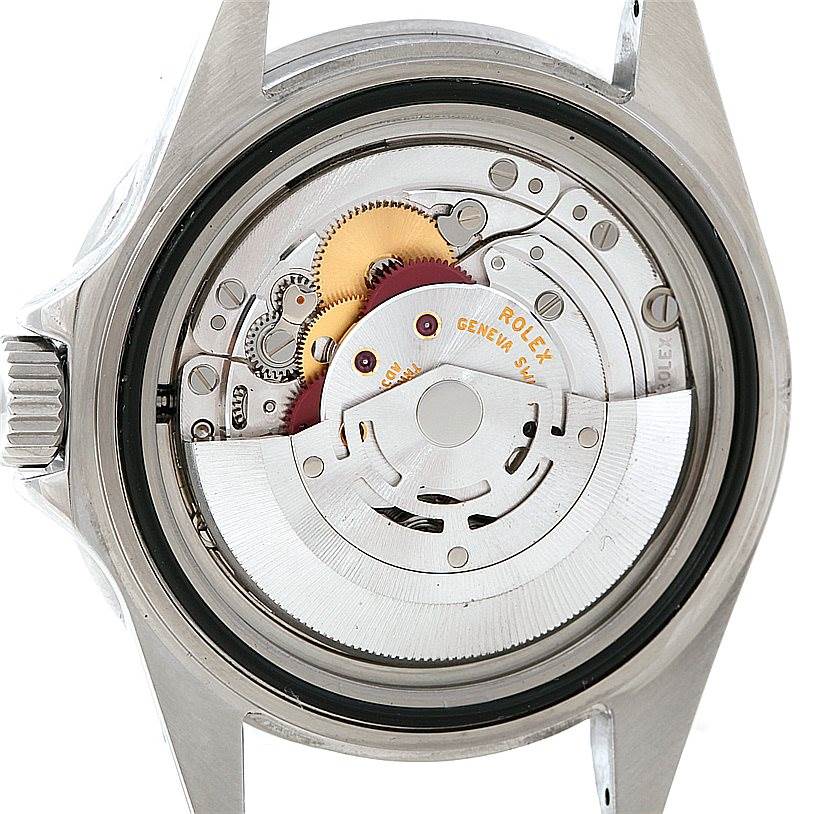 This image shows the back of a Rolex Submariner 16610V Men
s Stainless Steel Black Dial 16610V Men
s Stainless Steel Black Dial watch with the internal mechanical movement visible.