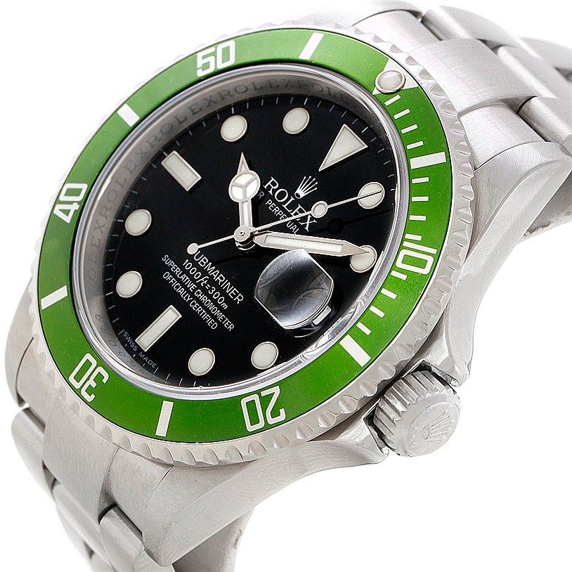 The image shows a close-up of the Rolex Submariner 16610V Men
s Stainless Steel Black Dial 16610V Men
s Stainless Steel Black Dial, highlighting its green bezel, black dial, crown, and part of the bracelet.