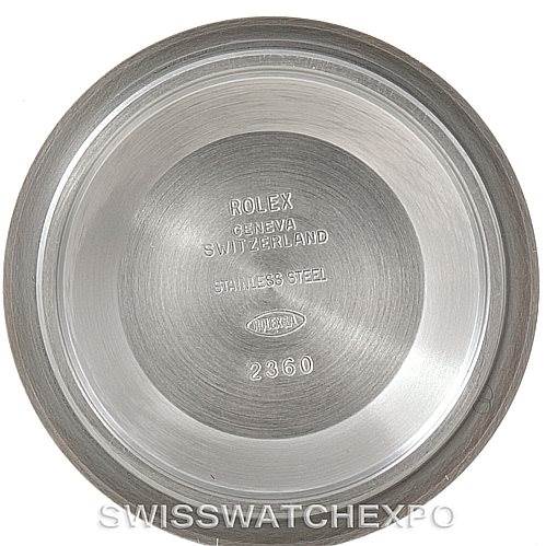 This image shows the inside case back of a Rolex Submariner 114060 Men
s Stainless Steel Black Dial 114060 Men
s Stainless Steel Black Dial watch, featuring engraved details on stainless steel.