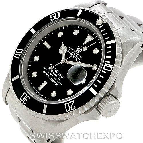 This image shows a Rolex Submariner 16610 Men
s Stainless Steel Black Dial 16610 Men
s Stainless Steel Black Dial watch at a slight angle, highlighting its bezel, crown, and face with visible text and date magnifier.