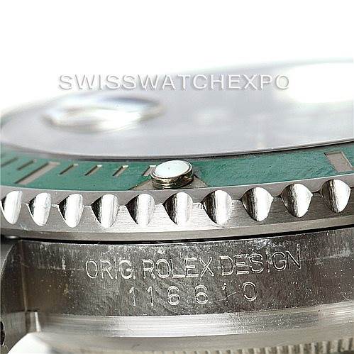 This close-up image of the Rolex Submariner 116610LV Men
s Stainless Steel Green Dial 116610LV Men
s Stainless Steel Green Dial watch showcases the bezel, case, and part of the bracelet, with engraved model details.
