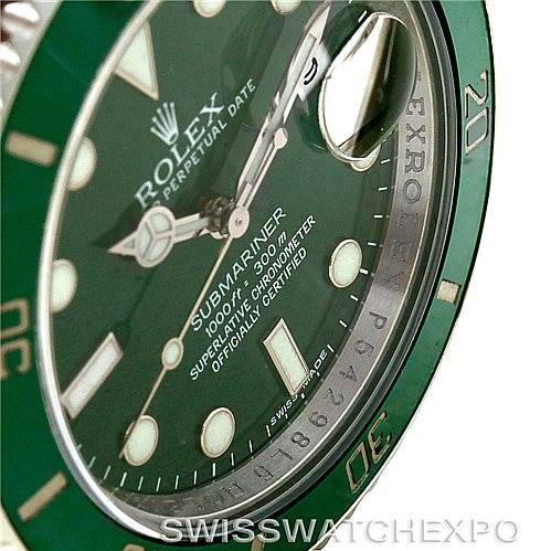 This image shows a close-up view of the dial and bezel of a Rolex Submariner 116610LV Men
s Stainless Steel Green Dial 116610LV Men
s Stainless Steel Green Dial watch with a green dial and bezel insert.