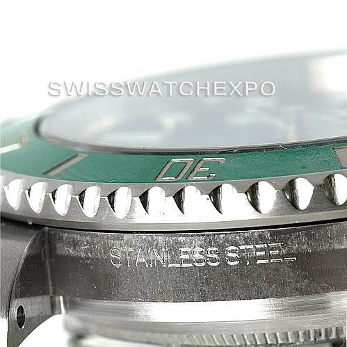 The image shows a close-up, side angle of the bezel and case side of a Rolex Submariner 116610LV Men
s Stainless Steel Green Dial 116610LV Men
s Stainless Steel Green Dial watch, highlighting the "STAINLESS STEEL" engraving.