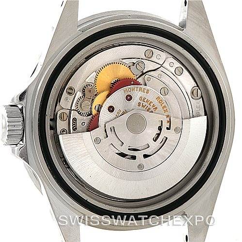 This image shows the open case back and movement of a Rolex Submariner 16610 Men
s Stainless Steel Black Dial 16610 Men
s Stainless Steel Black Dial watch, highlighting its internal components.