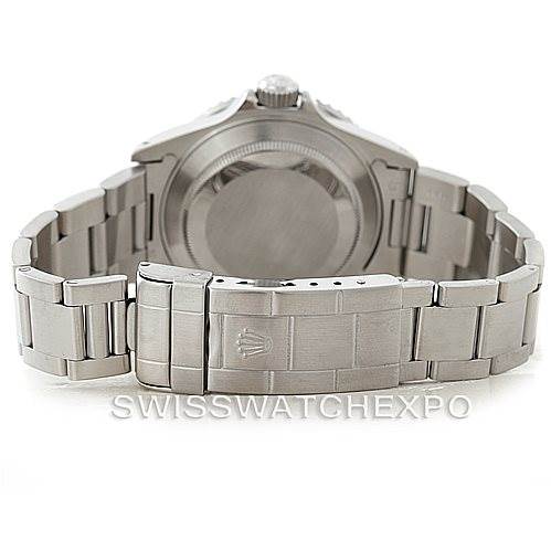 The image shows the back and bracelet of a Rolex Submariner 16610 Men
s Stainless Steel Black Dial 16610 Men
s Stainless Steel Black Dial watch, primarily focusing on the clasp and case back.