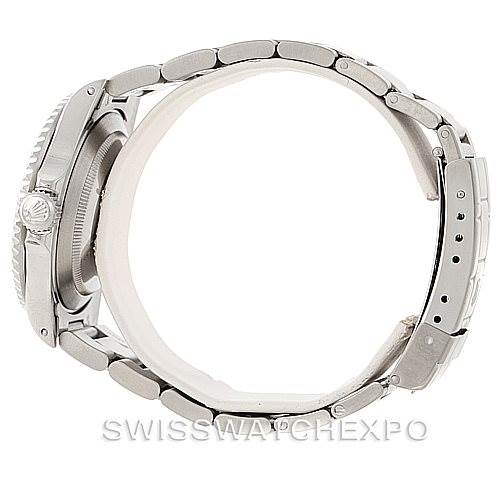 The image shows a side view of a Rolex Submariner 16610 Men
s Stainless Steel Black Dial 16610 Men
s Stainless Steel Black Dial watch, featuring its bracelet and clasp mechanism.