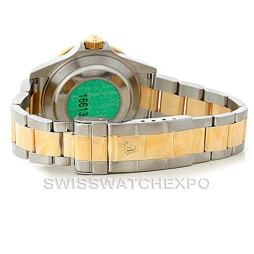 The image shows the back and the bracelet of a Rolex Submariner 16613 Men's Steel and Gold (two tone) Black Dial 16613 Men's Steel and Gold (two tone) Black Dial watch.