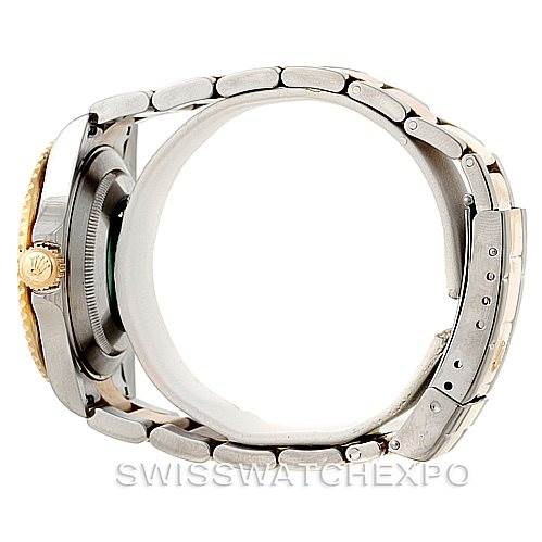This image shows a side angle of the Rolex Submariner 16613 Men's Steel and Gold (two tone) Black Dial 16613 Men's Steel and Gold (two tone) Black Dial watch, highlighting the bracelet, clasp, and crown.