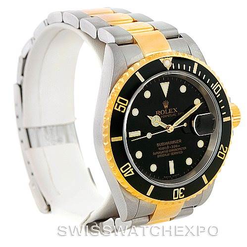 The image shows a Rolex Submariner 16613 Men's Steel and Gold (two tone) Black Dial 16613 Men's Steel and Gold (two tone) Black Dial watch angled to display the bezel, dial, and bracelet with gold and silver tones.