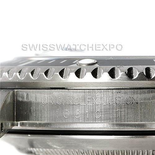 This is a side view of the Rolex Submariner 16610 Men
s Stainless Steel Black Dial 16610 Men
s Stainless Steel Black Dial watch, showing the engraved model number on the case and part of the bezel.