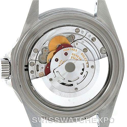 This image shows the back view of a Rolex Submariner 16610 Men
s Stainless Steel Black Dial 16610 Men
s Stainless Steel Black Dial watch, highlighting the internal mechanical movement.