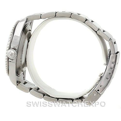 This image shows a side view of the Rolex Submariner 16610 Men
s Stainless Steel Black Dial 16610 Men
s Stainless Steel Black Dial watch, highlighting its bracelet, case, and crown.