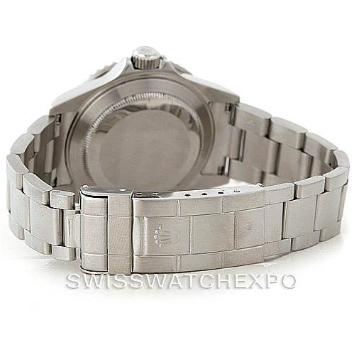 The image shows the backside and bracelet of a Rolex Submariner 16610 Men
s Stainless Steel Black Dial 16610 Men
s Stainless Steel Black Dial watch, highlighting the clasp and case back.