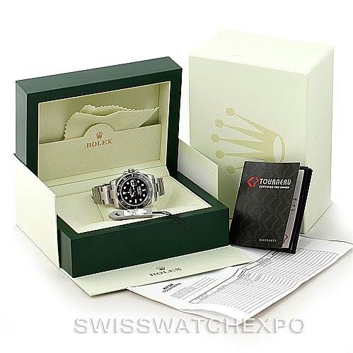The image shows a Rolex Submariner 116610 Men
s Stainless Steel Black Dial 116610 Men
s Stainless Steel Black Dial watch at a front angle, with its box, warranty booklet, and accompanying documents.