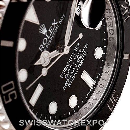This image shows a close-up, angled view of the black dial and bezel of a Rolex Submariner 116610 Men
s Stainless Steel Black Dial 116610 Men
s Stainless Steel Black Dial watch, highlighting the markers and hands.