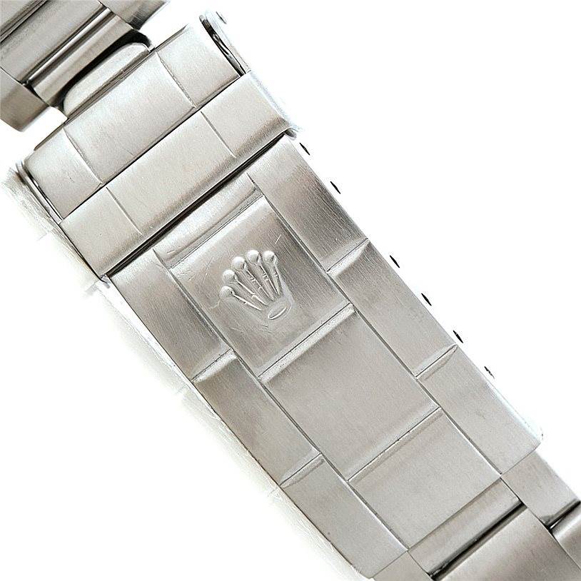The image shows a close-up of the clasp on the bracelet of a Rolex Submariner 14060 Men
s Stainless Steel Black Dial 14060 Men
s Stainless Steel Black Dial watch.