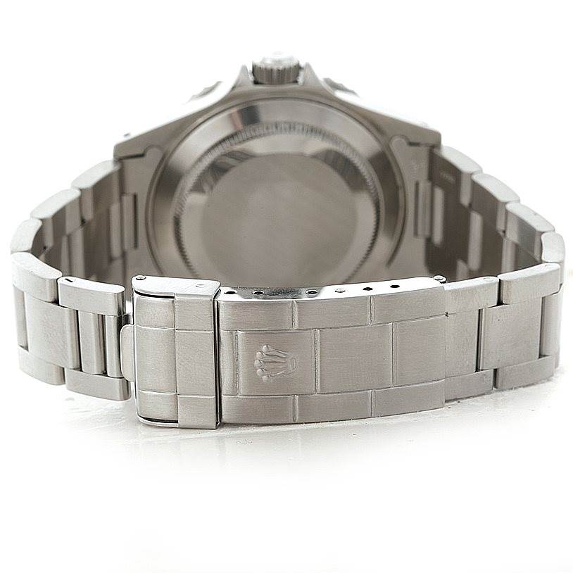 The image shows the rear view of the Rolex Submariner 14060 Men
s Stainless Steel Black Dial 14060 Men
s Stainless Steel Black Dial watch, highlighting the closed clasp and part of the bracelet.