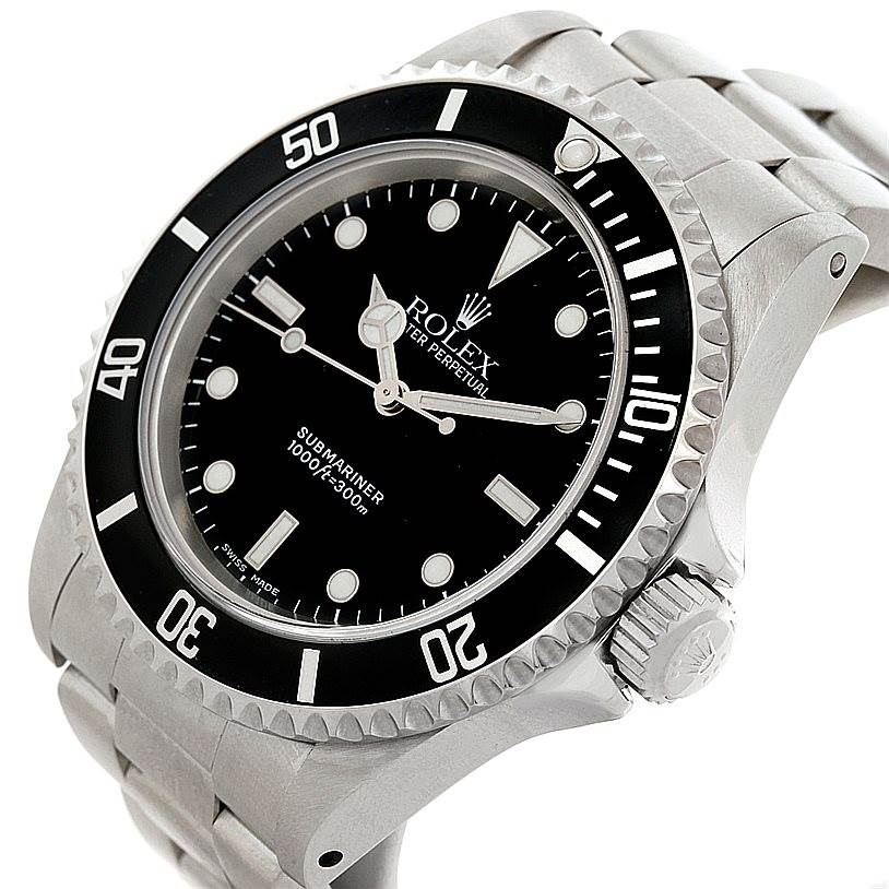 The image displays a side angle of a Rolex Submariner 14060 Men
s Stainless Steel Black Dial 14060 Men
s Stainless Steel Black Dial watch, focusing on the dial, bezel, crown, and part of the bracelet.