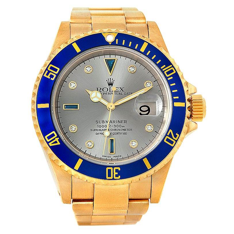 The image shows a frontal view of a Rolex Submariner 16618 Men's Yellow Gold Grey Dial 16618 Men's Yellow Gold Grey Dial watch with a gold bracelet and a blue bezel.