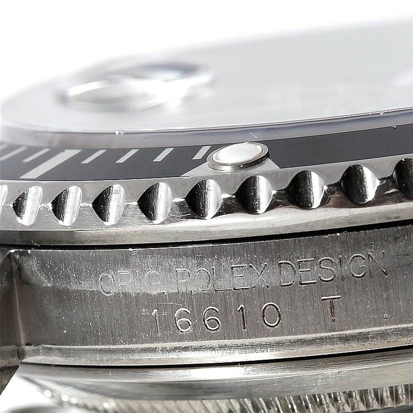This image shows a close-up side view of the bezel and case of a Rolex Submariner 16610 Men
s Stainless Steel Black Dial 16610 Men
s Stainless Steel Black Dial model 16610.
