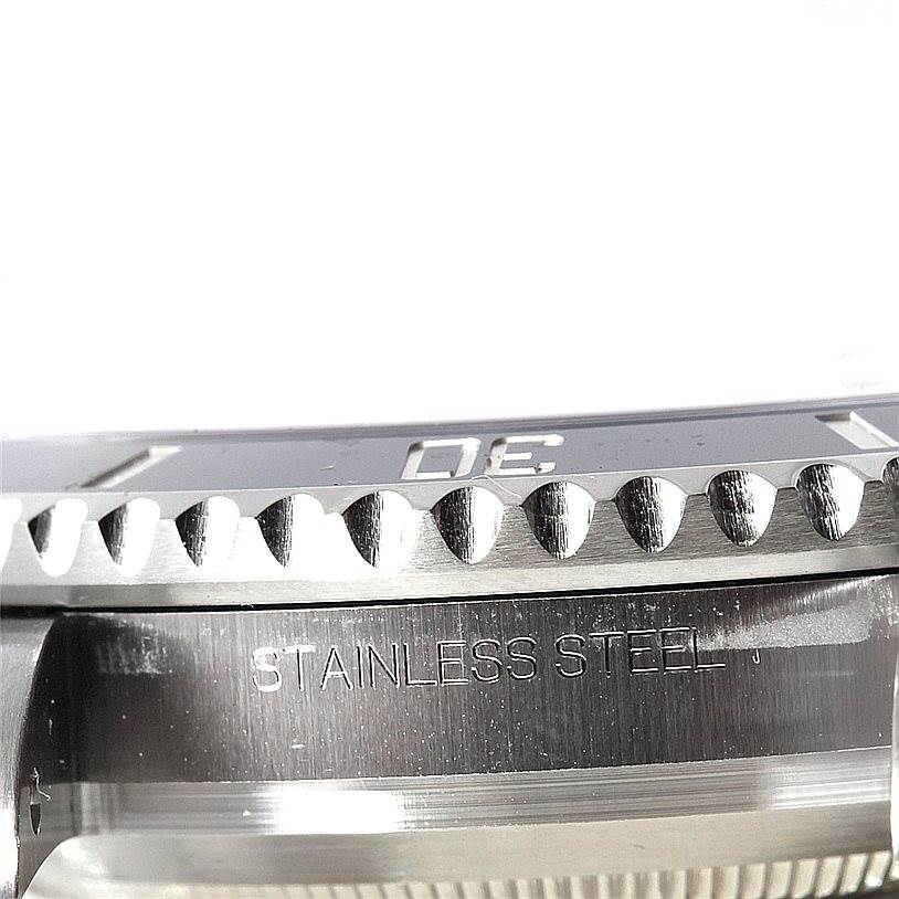 This image shows a close-up side view of a Rolex Submariner 116610 Men
s Stainless Steel Black Dial 116610 Men
s Stainless Steel Black Dial
s stainless steel case and bezel.