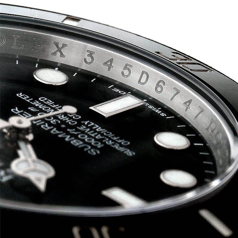 Close-up of a Rolex Submariner 116610 Men
s Stainless Steel Black Dial 116610 Men
s Stainless Steel Black Dial watch showing the engraved rehaut, dial, and part of the bezel.