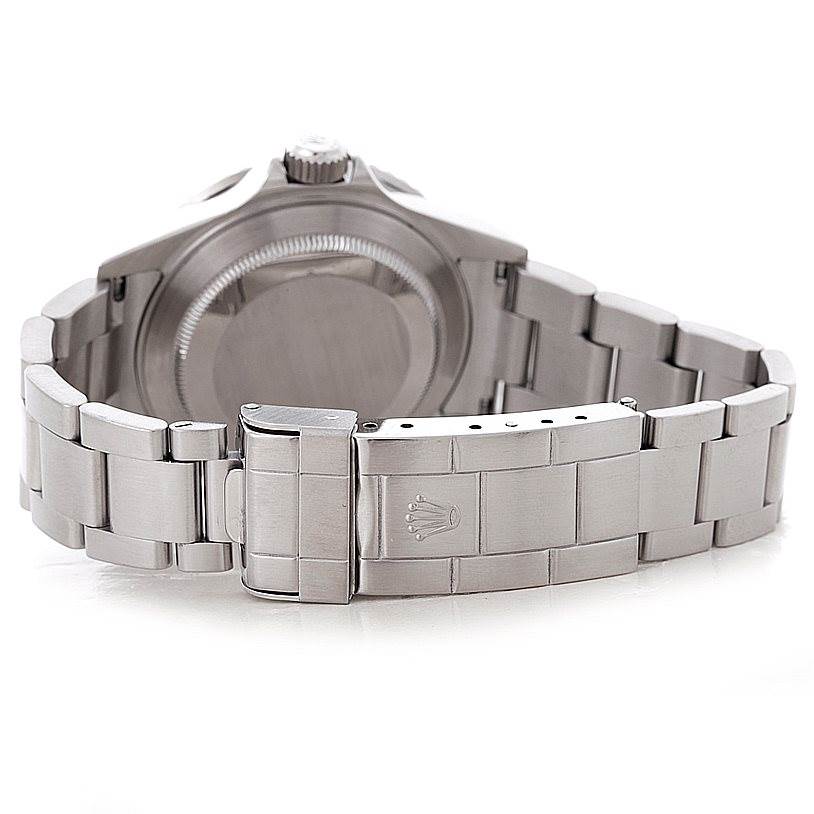 The image shows the back case and bracelet clasp of a Rolex Submariner 16610 Men
s Stainless Steel Black Dial 16610 Men
s Stainless Steel Black Dial.