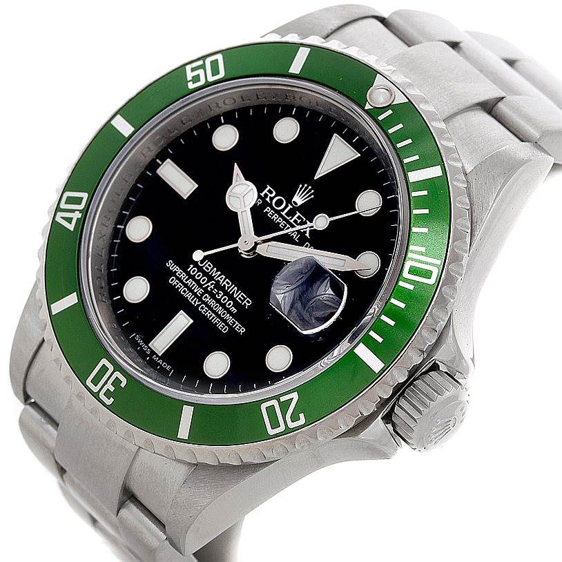 The image shows a Rolex Submariner 16610 Men
s Stainless Steel Black Dial 16610 Men
s Stainless Steel Black Dial watch from a three-quarter angle, highlighting its green bezel, black dial, and stainless steel bracelet.