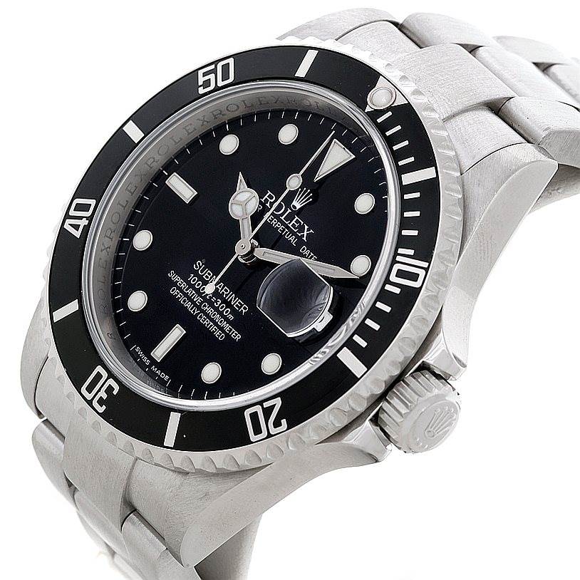 The image shows a Rolex Submariner 16610 Men
s Stainless Steel Black Dial 16610 Men
s Stainless Steel Black Dial watch from a front-right angle, highlighting its black dial, bezel, and metal bracelet.