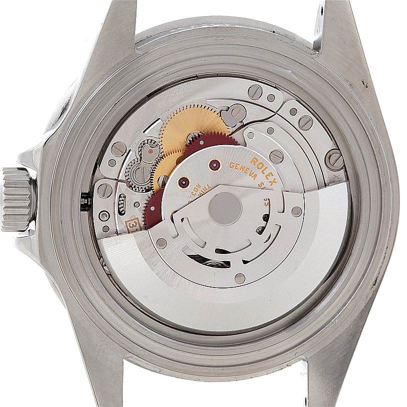 This image shows the open case back of a Rolex Submariner 16610 Men
s Stainless Steel Black Dial 16610 Men
s Stainless Steel Black Dial watch, revealing its internal mechanical movement.