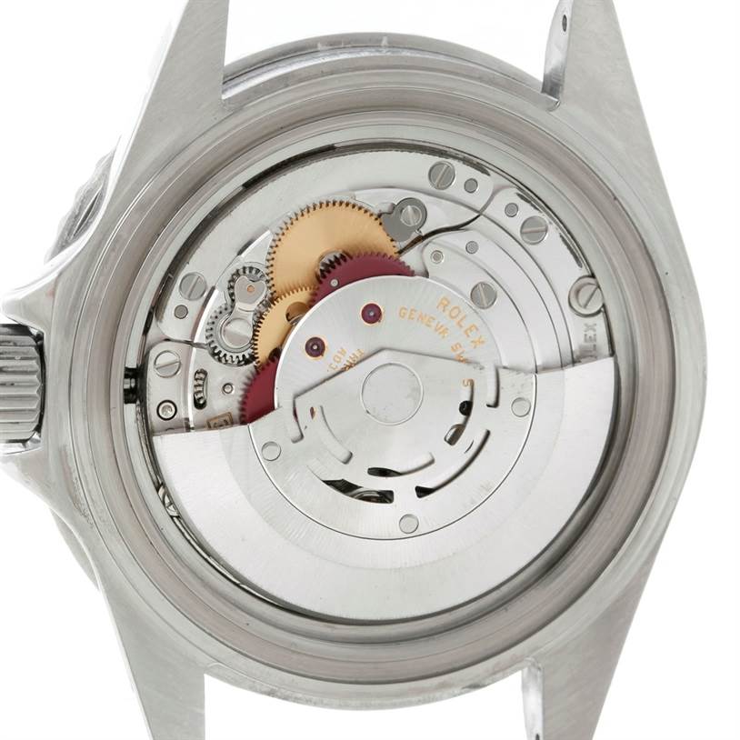 This image shows the open case back revealing the inner mechanical movement of a Rolex Submariner 16610 Men
s Stainless Steel Black Dial 16610 Men
s Stainless Steel Black Dial watch.