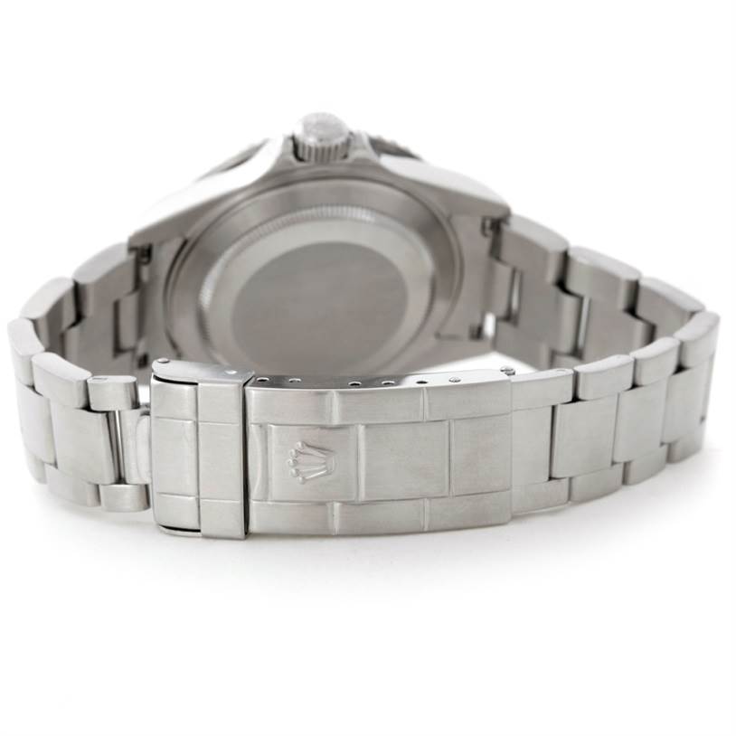 The image shows the back view of a Rolex Submariner 16610 Men
s Stainless Steel Black Dial 16610 Men
s Stainless Steel Black Dial watch, focusing on its stainless steel bracelet and clasp.