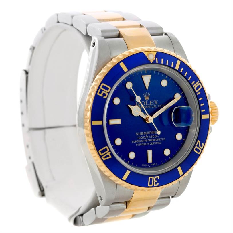 The image shows a front angled view of a Rolex Submariner 16613 Men's Steel and Gold (two tone) Blue Dial 16613 Men's Steel and Gold (two tone) Blue Dial watch, highlighting its blue dial, bezel, and two-tone bracelet.