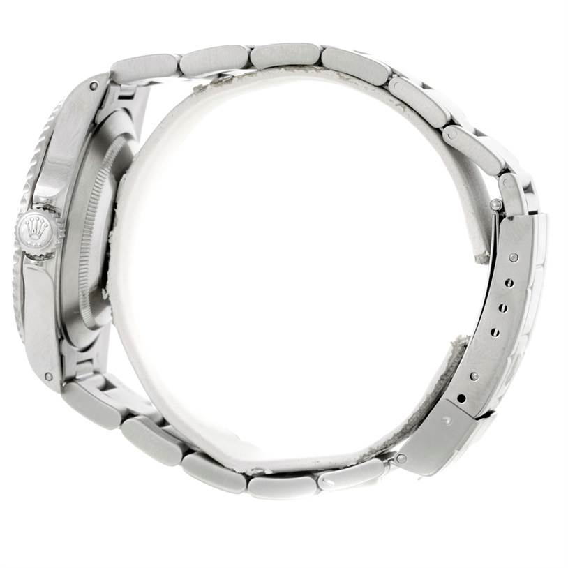 This image shows a side view of the Rolex Submariner 14060 Men
s Stainless Steel Black Dial 14060 Men
s Stainless Steel Black Dial watch focusing on the bracelet, clasp, case, and crown.