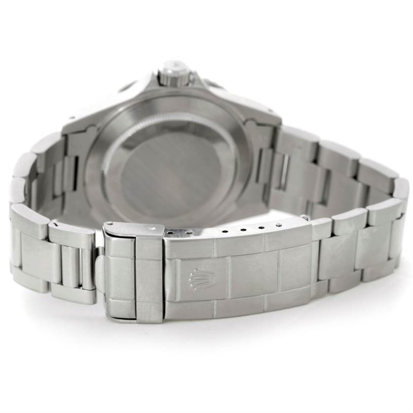 The image shows the back case and bracelet of a Rolex Submariner 14060 Men
s Stainless Steel Black Dial 14060 Men
s Stainless Steel Black Dial watch at an angled view.