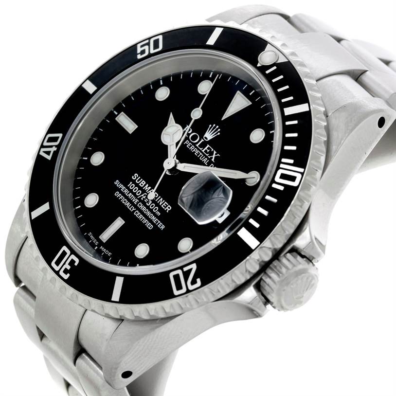 The image shows a close-up, angled view of the Rolex Submariner 16610 Men
s Stainless Steel Black Dial 16610 Men
s Stainless Steel Black Dial watch face, bezel, and part of the bracelet.