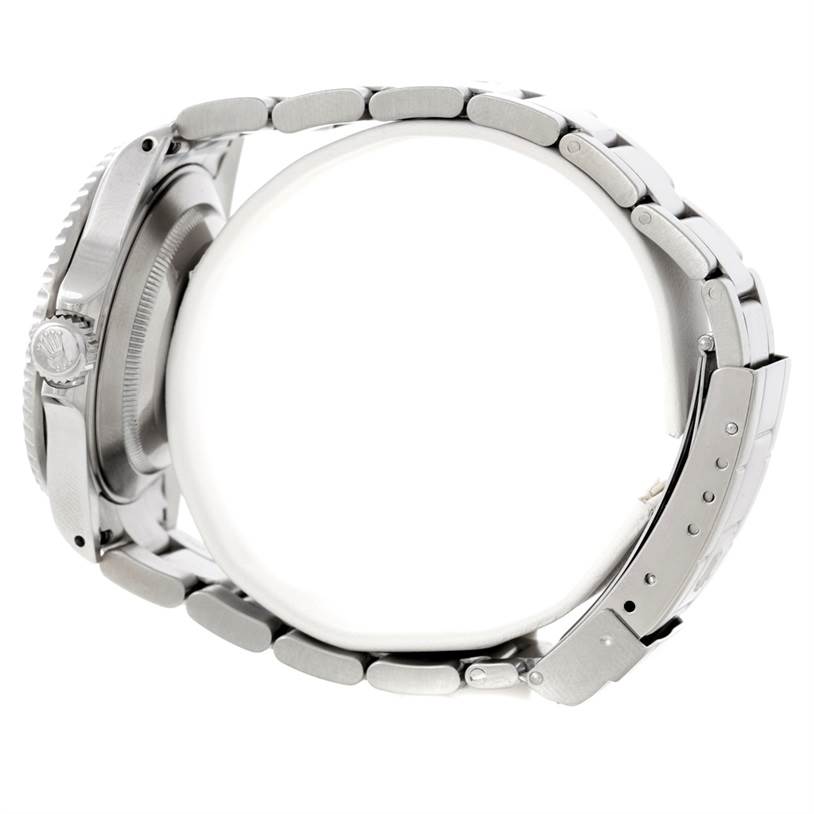 This image shows a side view of the Rolex Submariner 16610 Men
s Stainless Steel Black Dial 16610 Men
s Stainless Steel Black Dial watch focusing on the bracelet, crown, and clasp.