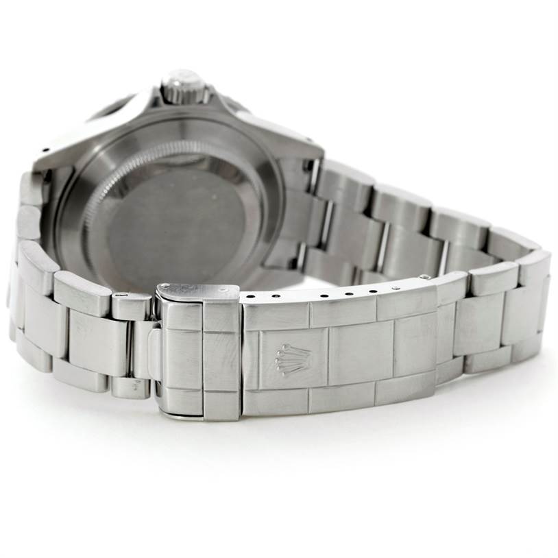 The image shows the back and clasp of a Rolex Submariner 16610 Men
s Stainless Steel Black Dial 16610 Men
s Stainless Steel Black Dial watch at an angled rear view.