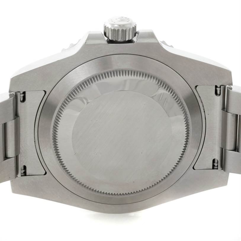 This image shows the back case and crown of a Rolex Submariner 114060 Men
s Stainless Steel Black Dial 114060 Men
s Stainless Steel Black Dial watch from a rear angle.