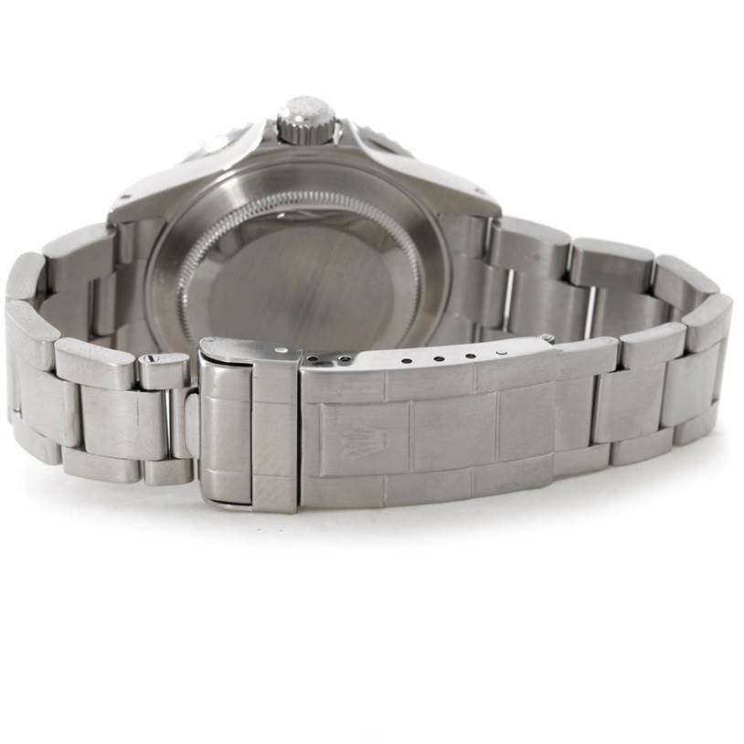 This image shows the back view of the Rolex Submariner 16610 Men
s Stainless Steel Black Dial 16610 Men
s Stainless Steel Black Dial watch, highlighting its clasp and bracelet.