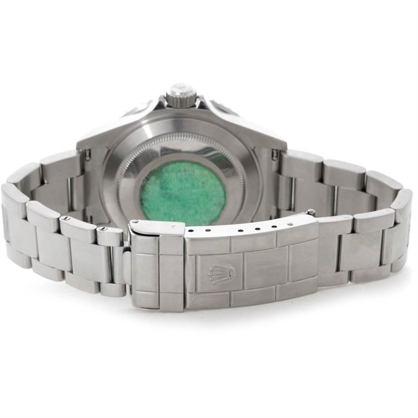 The image shows the back and bracelet of the Rolex Submariner 16610 Men
s Stainless Steel Black Dial 16610 Men
s Stainless Steel Black Dial watch, highlighting the clasp and case back.