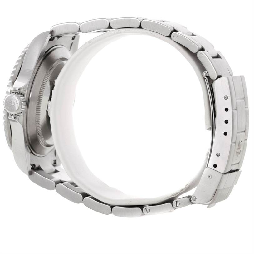 This image shows a side profile of the Rolex Submariner 16610 Men
s Stainless Steel Black Dial 16610 Men
s Stainless Steel Black Dial watch, highlighting the bracelet, clasp, and case back. 