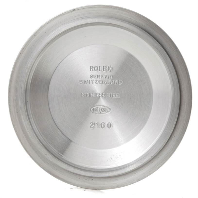 This image shows the inside of the case back of a Rolex Submariner 16610 Men
s Stainless Steel Black Dial 16610 Men
s Stainless Steel Black Dial watch, featuring the inscriptions and model details.