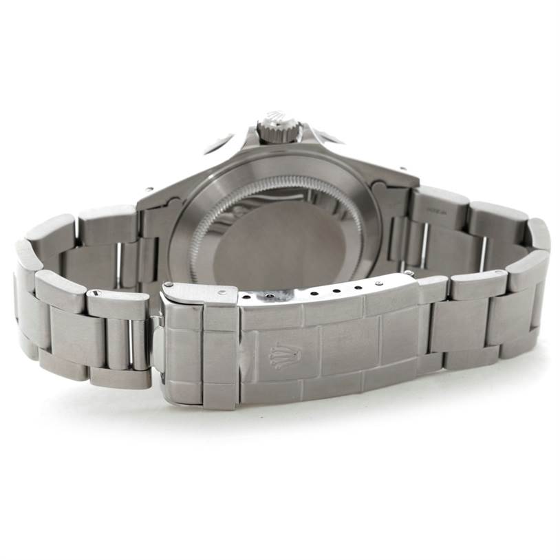 The image shows the back side of the Rolex Submariner 14060 Men
s Stainless Steel Black Dial 14060 Men
s Stainless Steel Black Dial watch, including the case back and metal bracelet with a clasp.