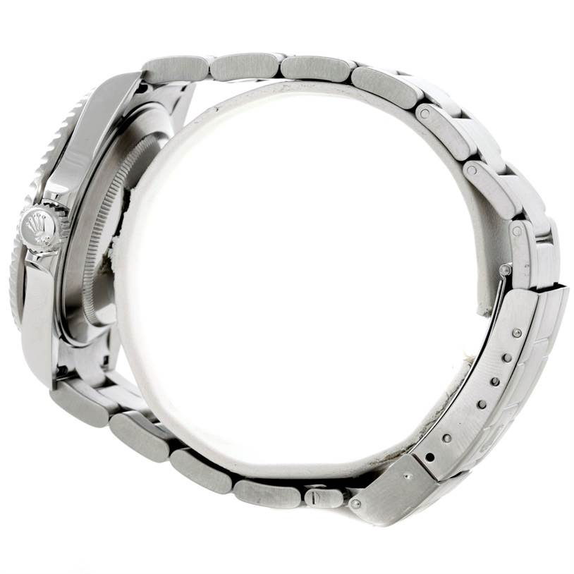 The image shows a side angle of the Rolex Submariner 16610 Men
s Stainless Steel Black Dial 16610 Men
s Stainless Steel Black Dial watch, highlighting the bracelet, clasp, and crown.