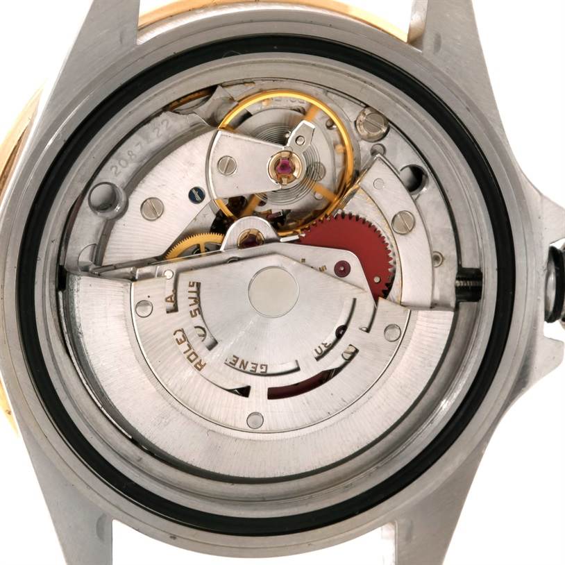 The image shows the back view of the Rolex Submariner 16803 Men's Steel and Gold (two tone) Black Dial 16803 Men's Steel and Gold (two tone) Black Dial model, highlighting its internal movement mechanism.