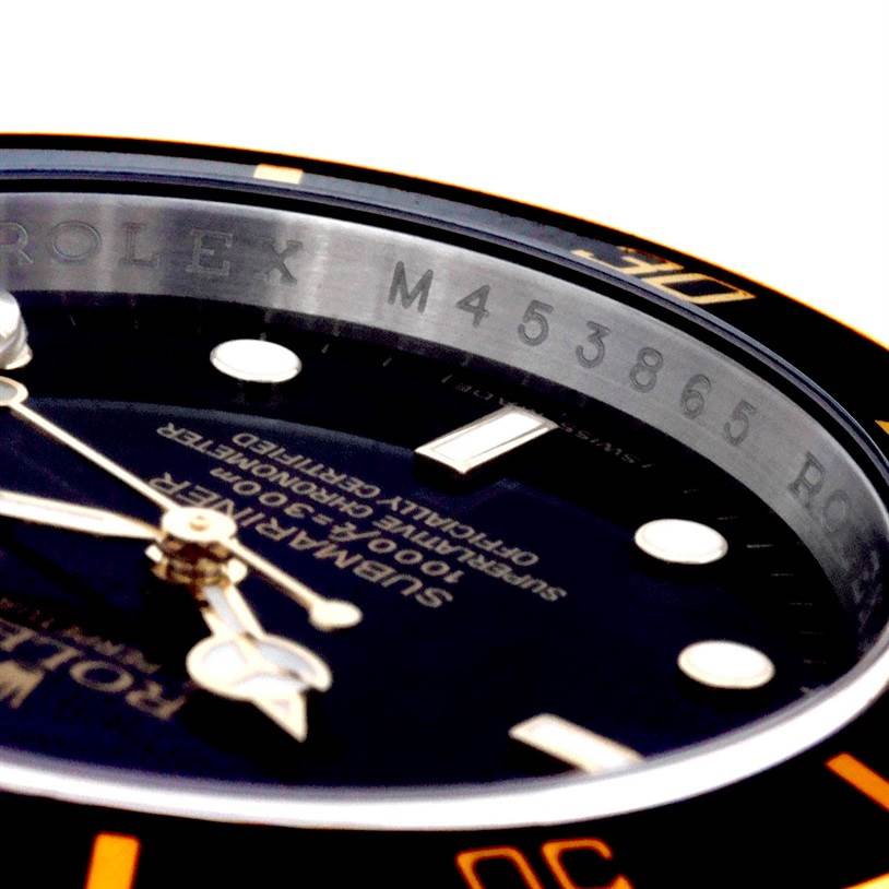 The image shows a close-up of the dial, hands, and bezel of a Rolex Submariner 16613 Men's Steel and Gold (two tone) Black Dial 16613 Men's Steel and Gold (two tone) Black Dial watch, highlighting the model and serial number.