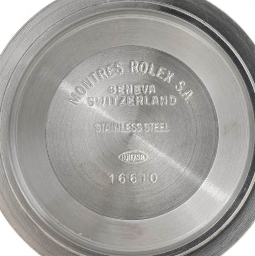 This is the case back of a Rolex Submariner 16613 Men's Steel and Gold (two tone) Grey Dial 16613 Men's Steel and Gold (two tone) Grey Dial watch, showing the inner engraving details.